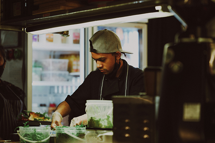 Hospitality worker preparing food